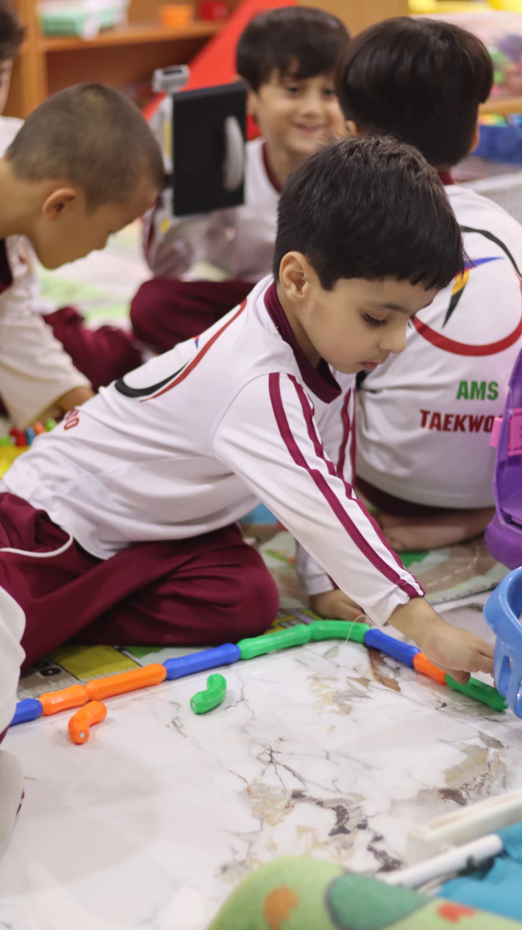 Children making colorful crafts together