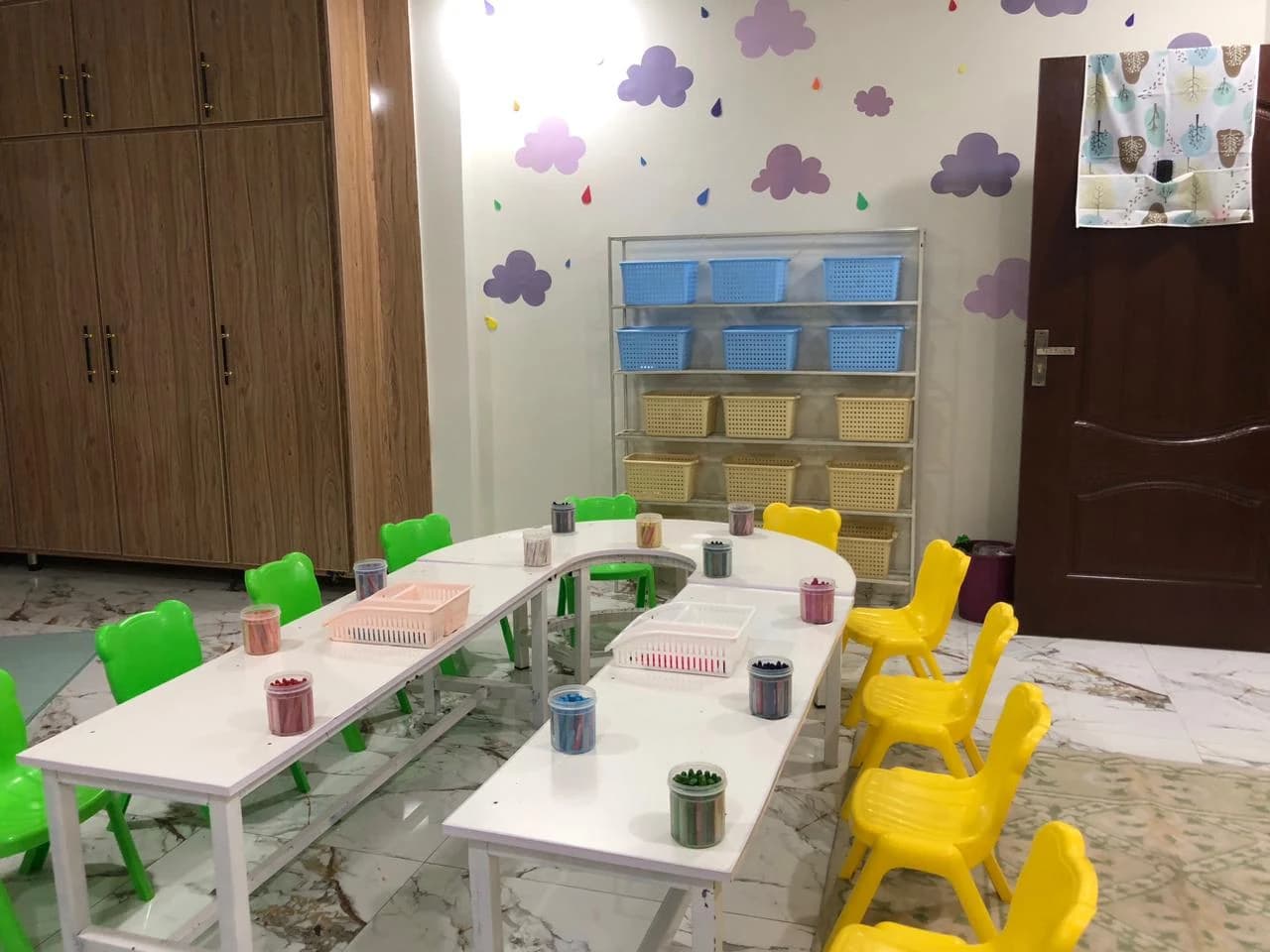 Early learning tables prepared for a classroom activity