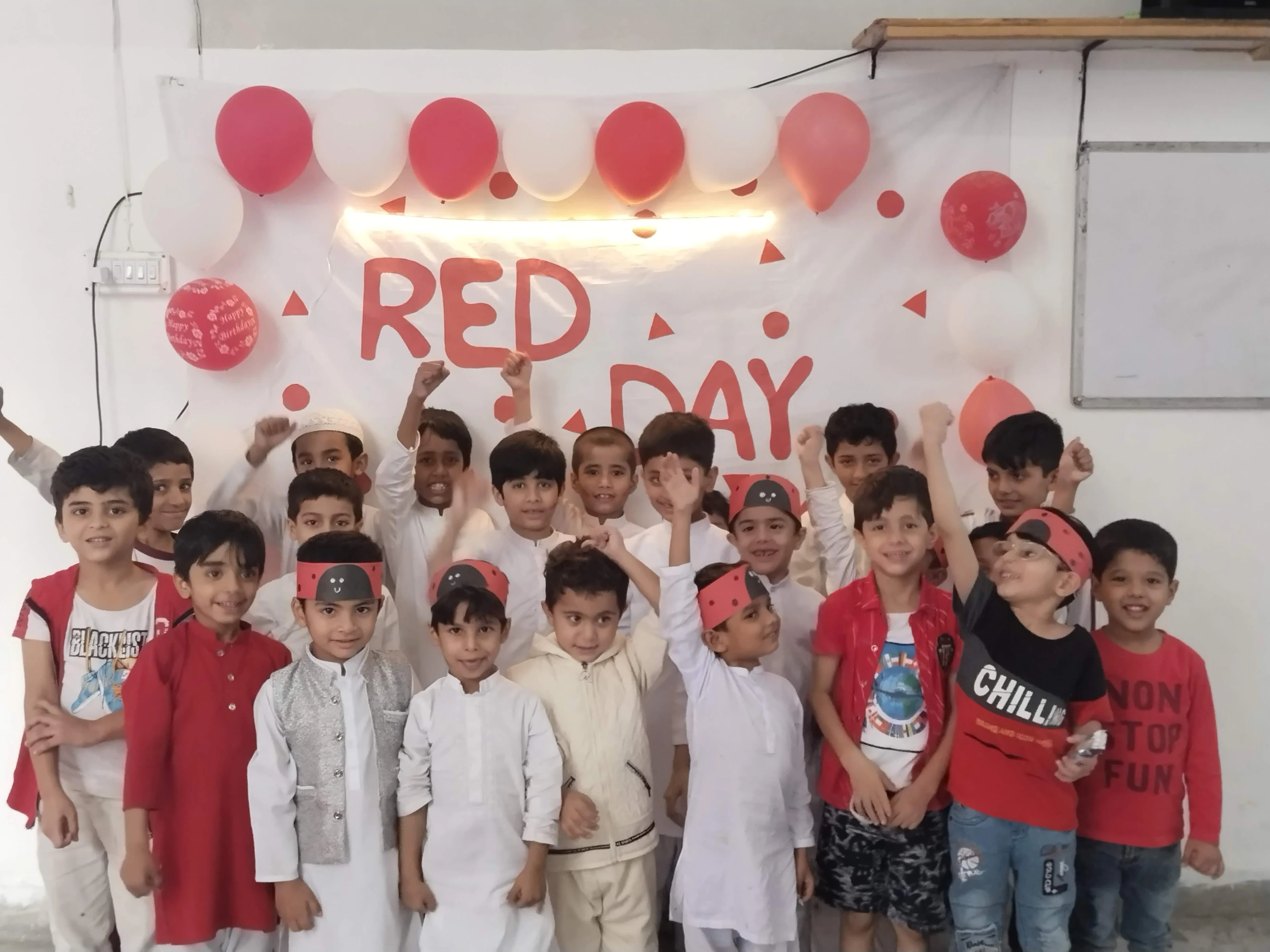 Students together at a Red Day activity