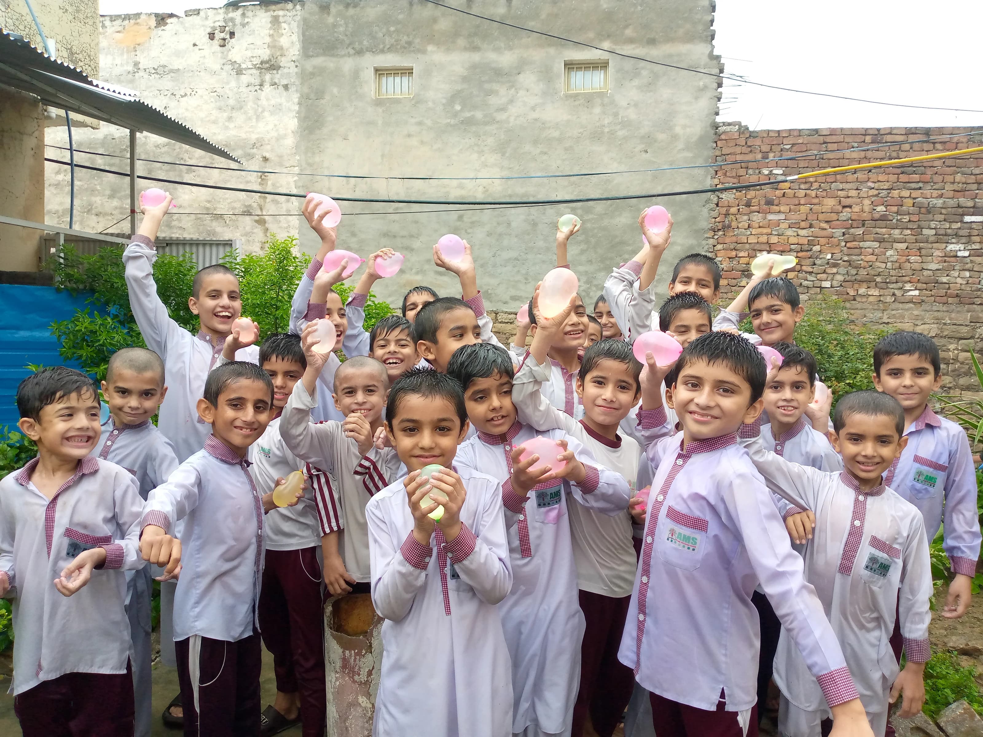 Students celebrating together outdoors