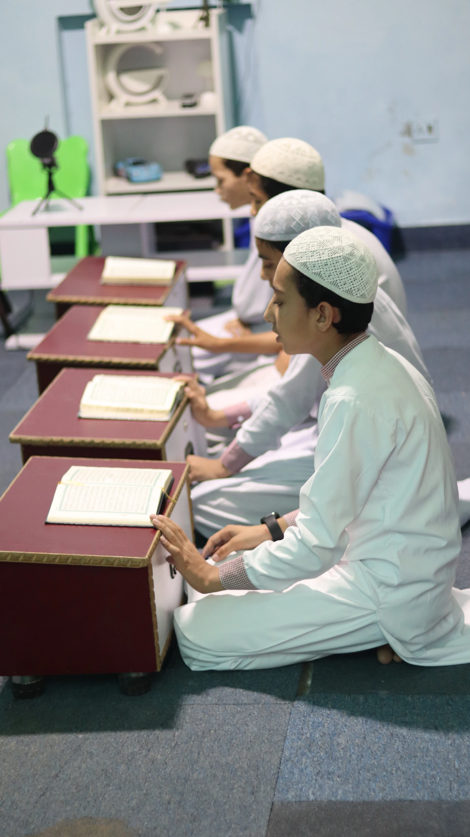 Advanced Minds School students reading together